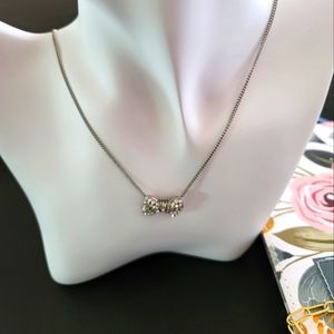 silver rhinestone ribbon necklace